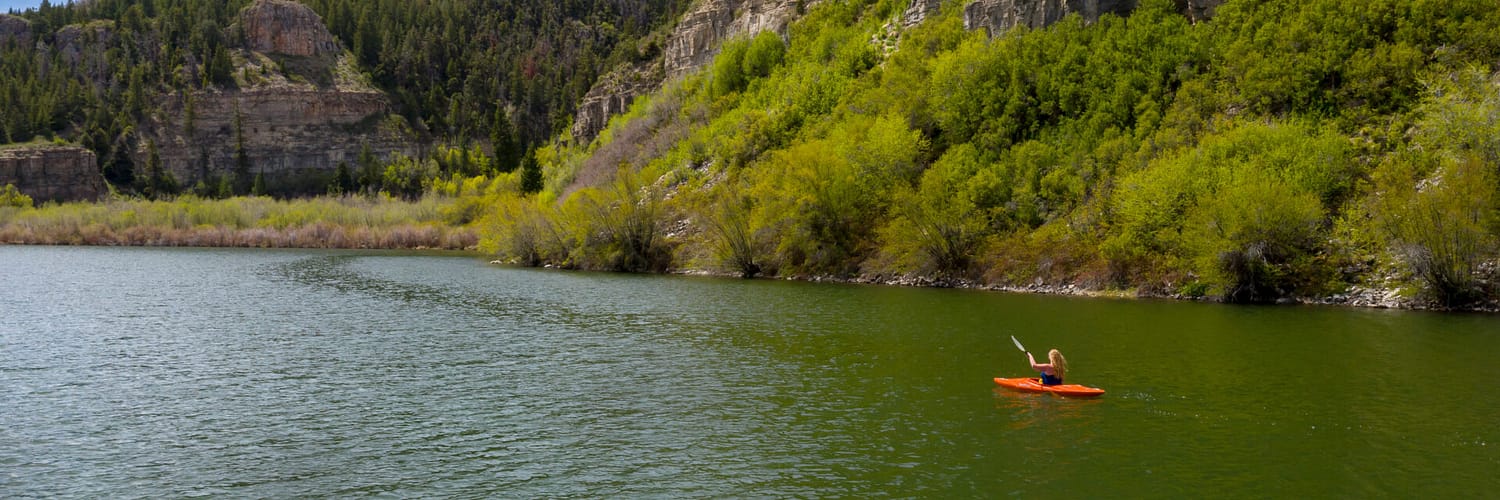 Kayaker on Sweetwater Lake, Spring, Garfield County, Colorado